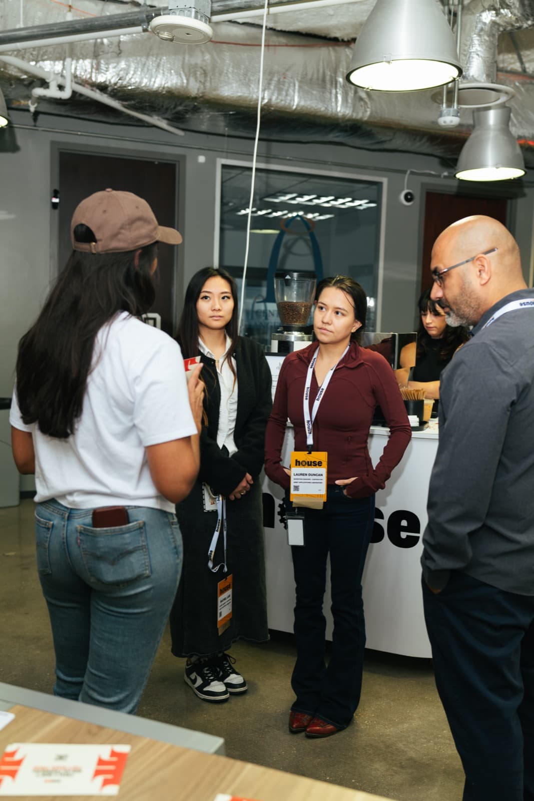 Attendees chatting over coffee